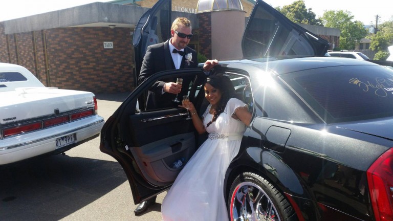 Bride and Groom arrive at reception